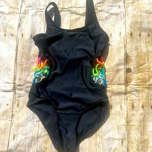 Girls black 1-piece with side cut out detail. Like new!